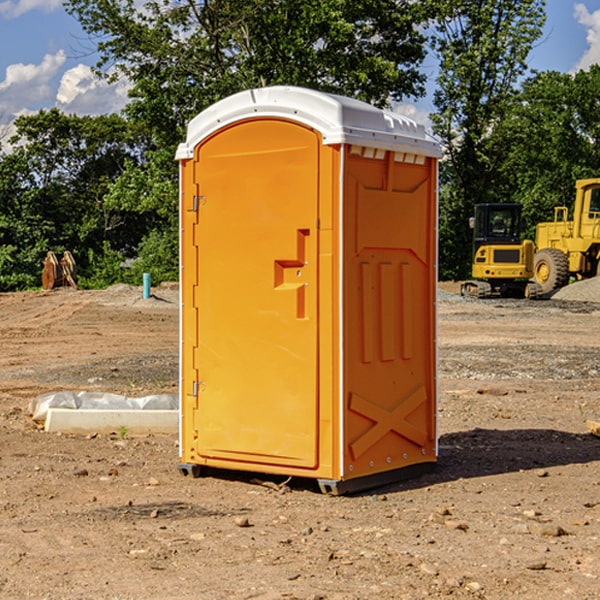 how often are the portable toilets cleaned and serviced during a rental period in Logan County